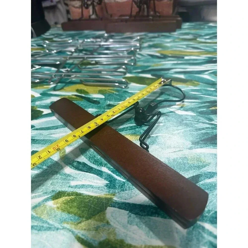 6 Wooden, 1 Metal Clothing Hangers